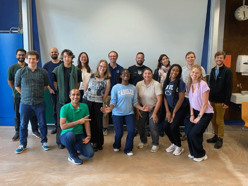 Students gathered for a group photo at a conference